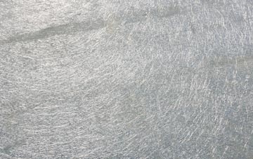 Slickly laminate fibreglass or shingles?